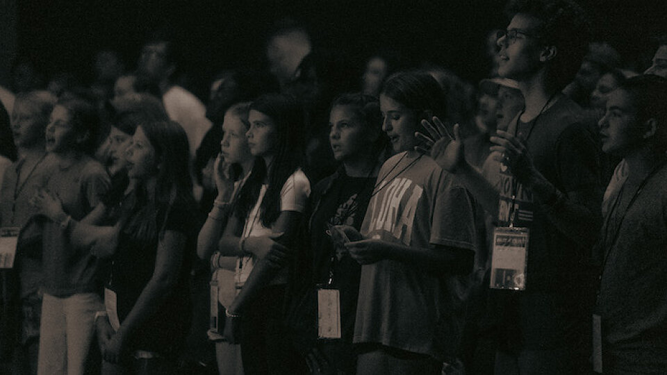 students during worship 700 wide